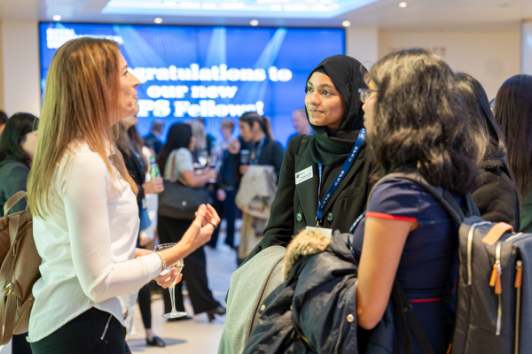 2023 Conference attendees talking